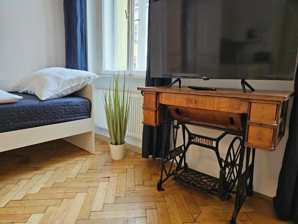 Postel nebo postele na pokoji v ubytování Slezska Apartments
