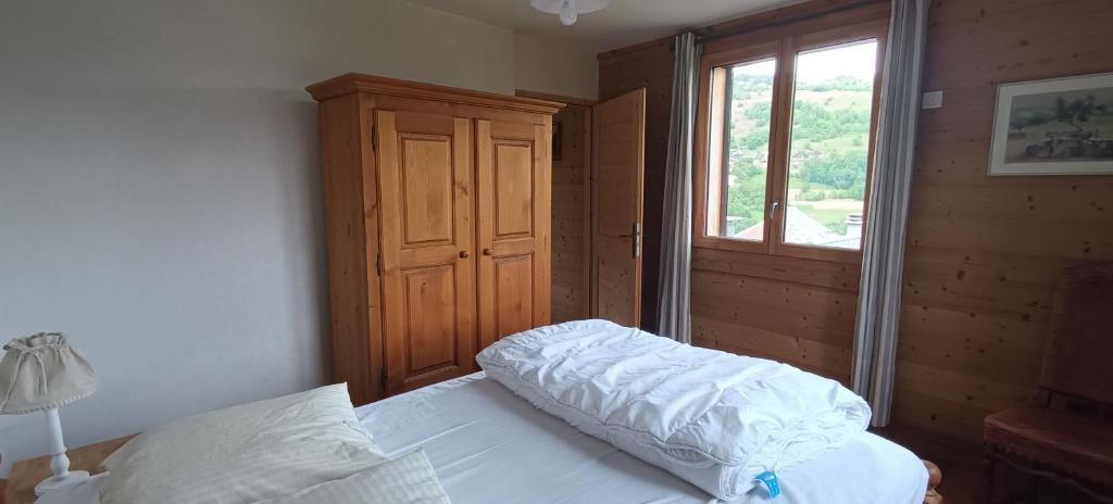 Postel nebo postele na pokoji v ubytování Le Chalet des Fées