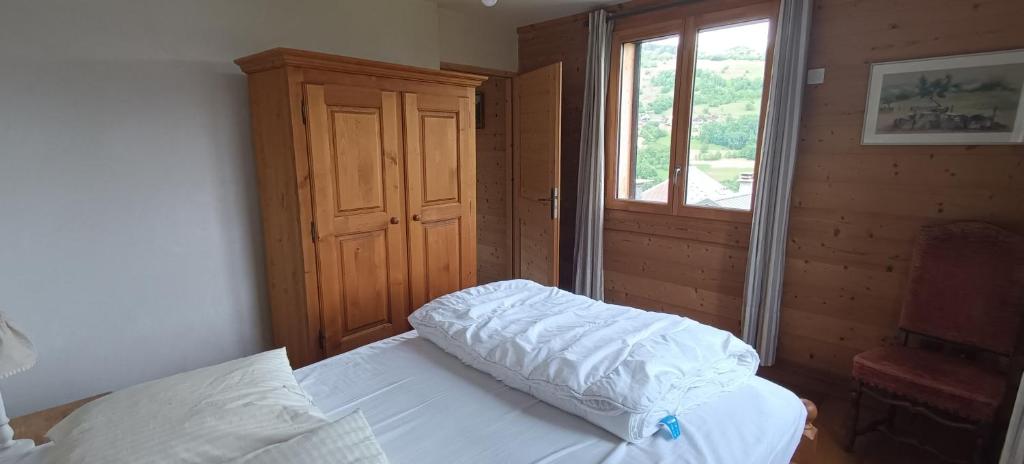 Postel nebo postele na pokoji v ubytování Le Chalet des Fées
