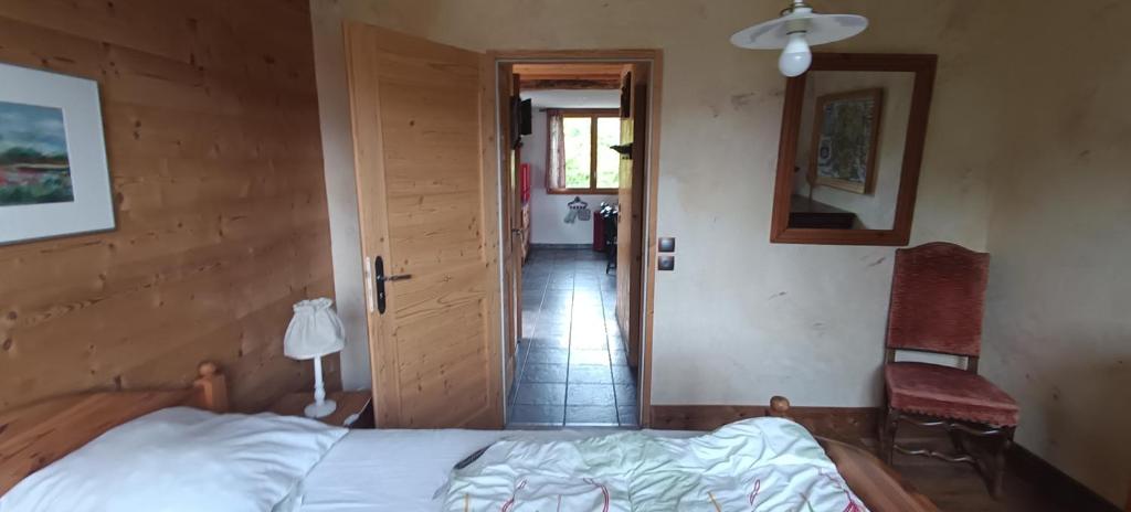 Postel nebo postele na pokoji v ubytování Le Chalet des Fées