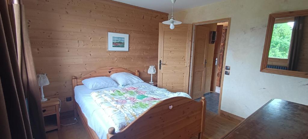 Postel nebo postele na pokoji v ubytování Le Chalet des Fées
