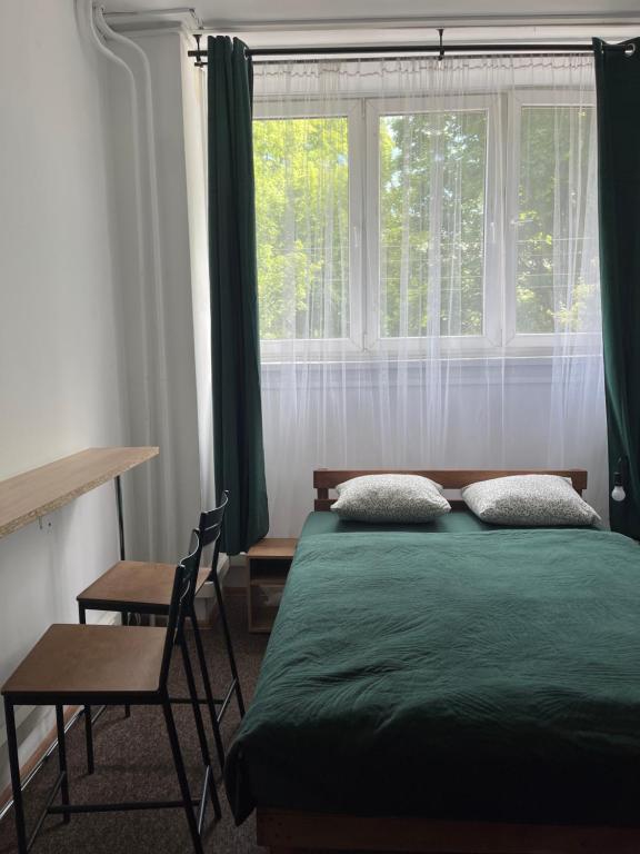 Posteľ alebo postele v izbe v ubytovaní Room in Old Town Krakow
