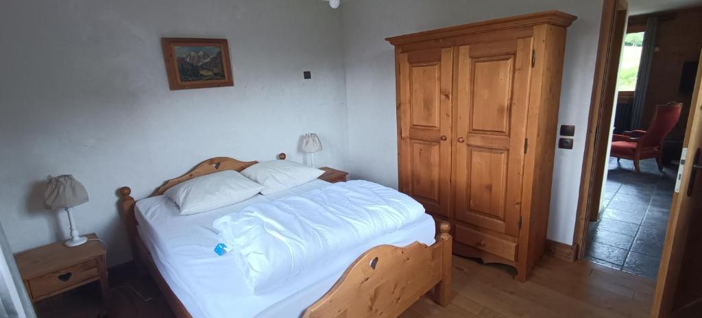 Postel nebo postele na pokoji v ubytování Le Chalet des Fées