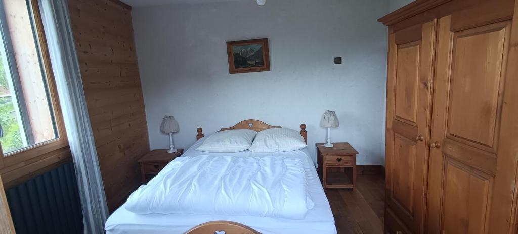 Postel nebo postele na pokoji v ubytování Le Chalet des Fées