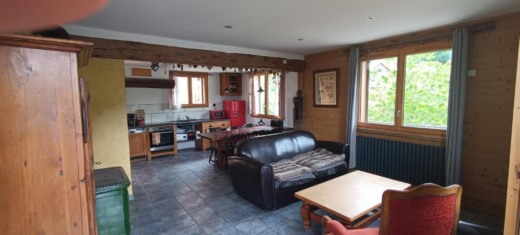 Posezení v ubytování Le Chalet des Fées