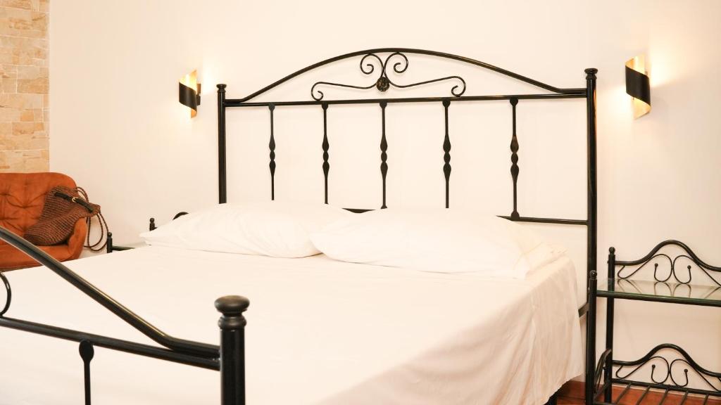 Posteľ alebo postele v izbe v ubytovaní Uria Rooms & Suite B&B