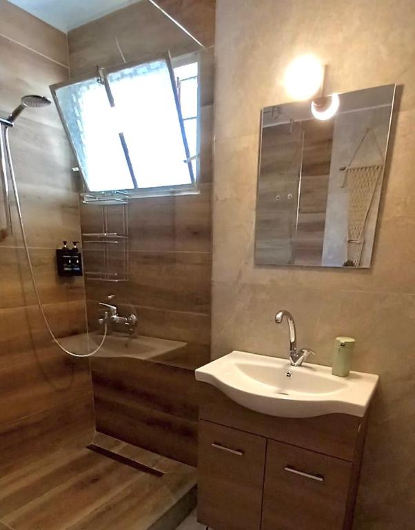 Koupelna v ubytování Moxy Paxos - Cozy Home