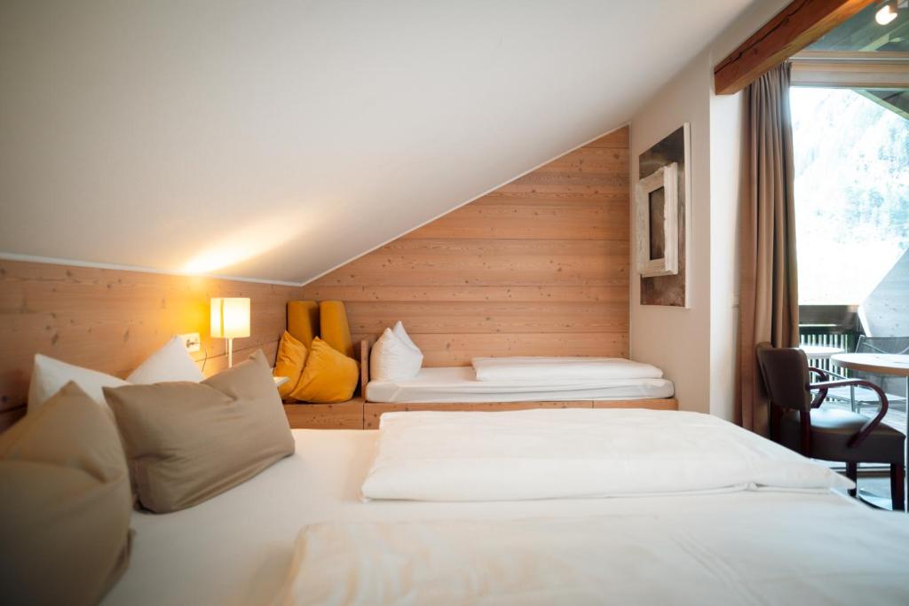 Postel nebo postele na pokoji v ubytování Landhaus Schösser-Brandler