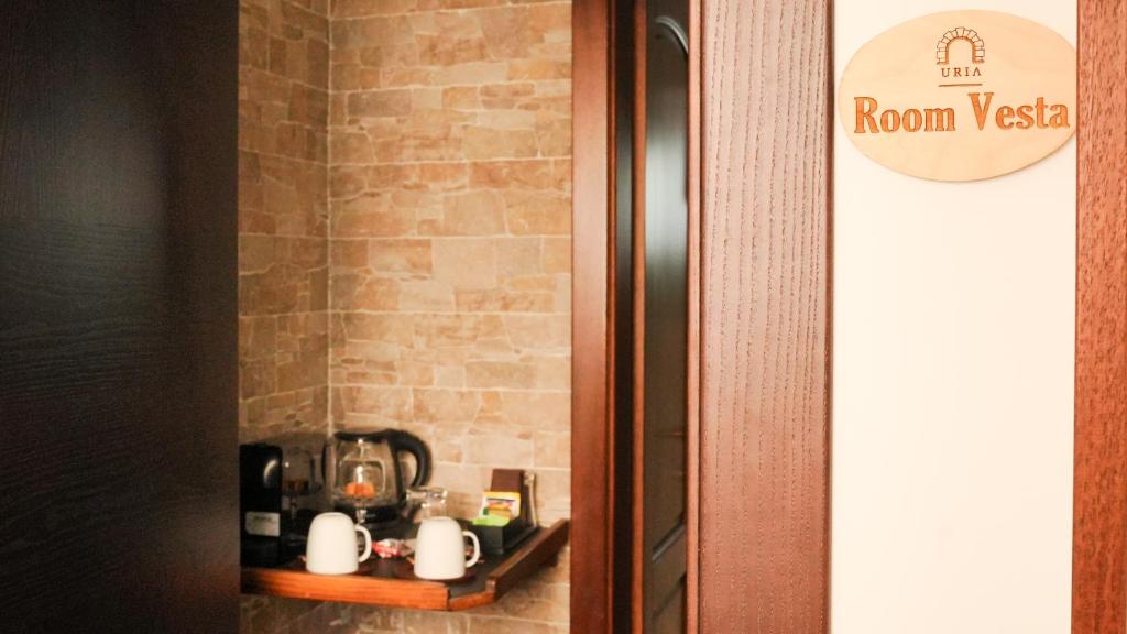 Certifikát, ocenenie alebo iný dokument vystavený v ubytovaní Uria Rooms & Suite B&B