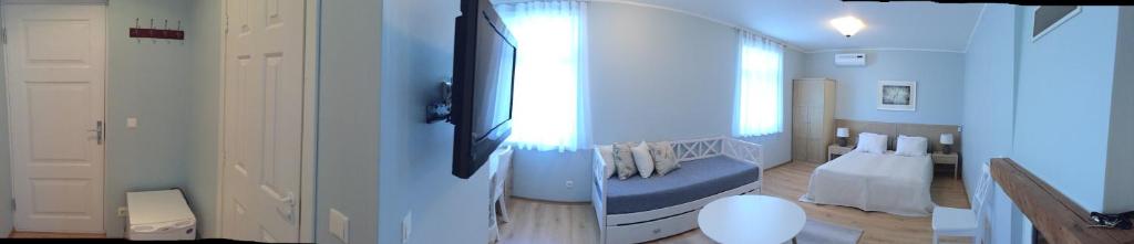 Postel nebo postele na pokoji v ubytování Tulbi Guesthouse