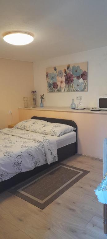 Postel nebo postele na pokoji v ubytování Apartman Tihana