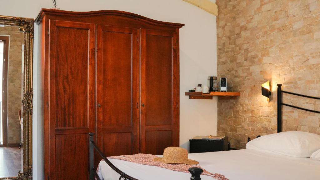 Posteľ alebo postele v izbe v ubytovaní Uria Rooms & Suite B&B