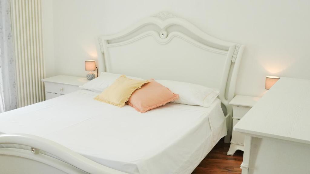 Posteľ alebo postele v izbe v ubytovaní Uria Rooms & Suite B&B