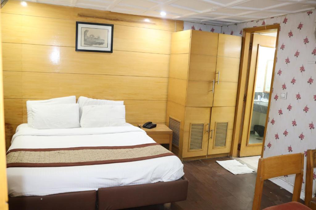 Postel nebo postele na pokoji v ubytování Hotels Daffodils