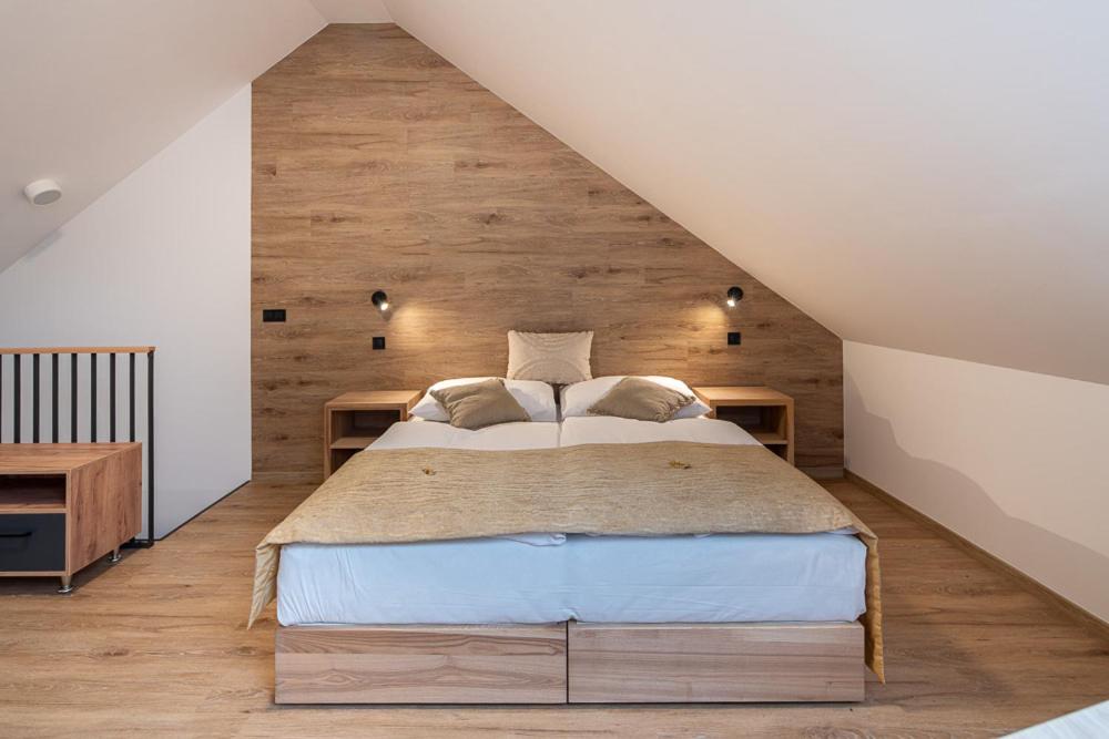 Postel nebo postele na pokoji v ubytování Resort Aurum Residence A