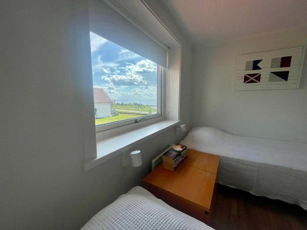 Postel nebo postele na pokoji v ubytování Äleklinta Gård