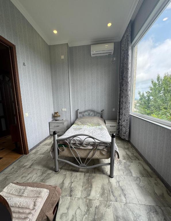 Postel nebo postele na pokoji v ubytování Hotel 9th Sky
