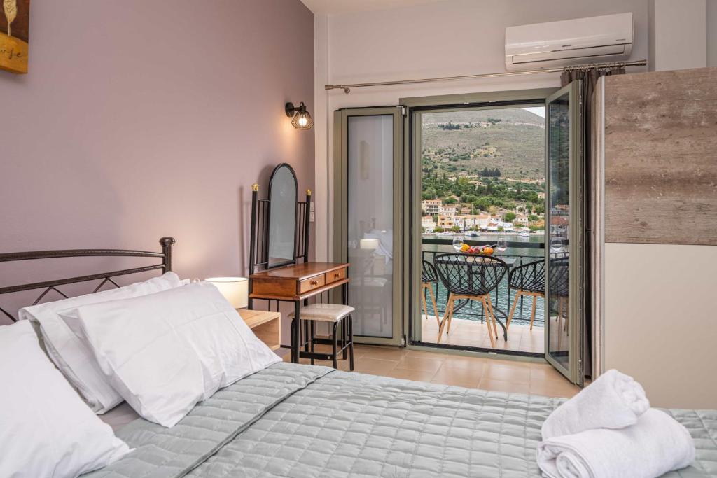 En eller flere senge i et værelse på Casa Mare2