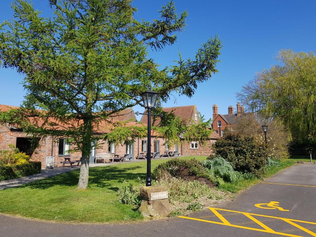 En have udenfor Walnut Cottage