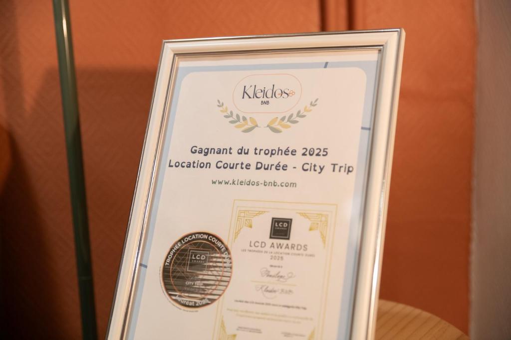 Certifikát, ocenenie alebo iný dokument vystavený v ubytovaní Olympe by Kleidos, Appartement 4P, rue calme, Centre Historique, Proche Gare