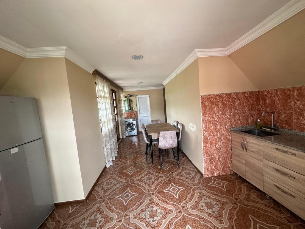 Kuchyň nebo kuchyňský kout v ubytování Linda Guest house