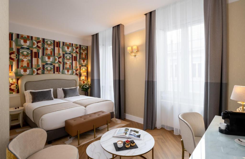 Postel nebo postele na pokoji v ubytování Leonardo Boutique Hotel Rome Monti