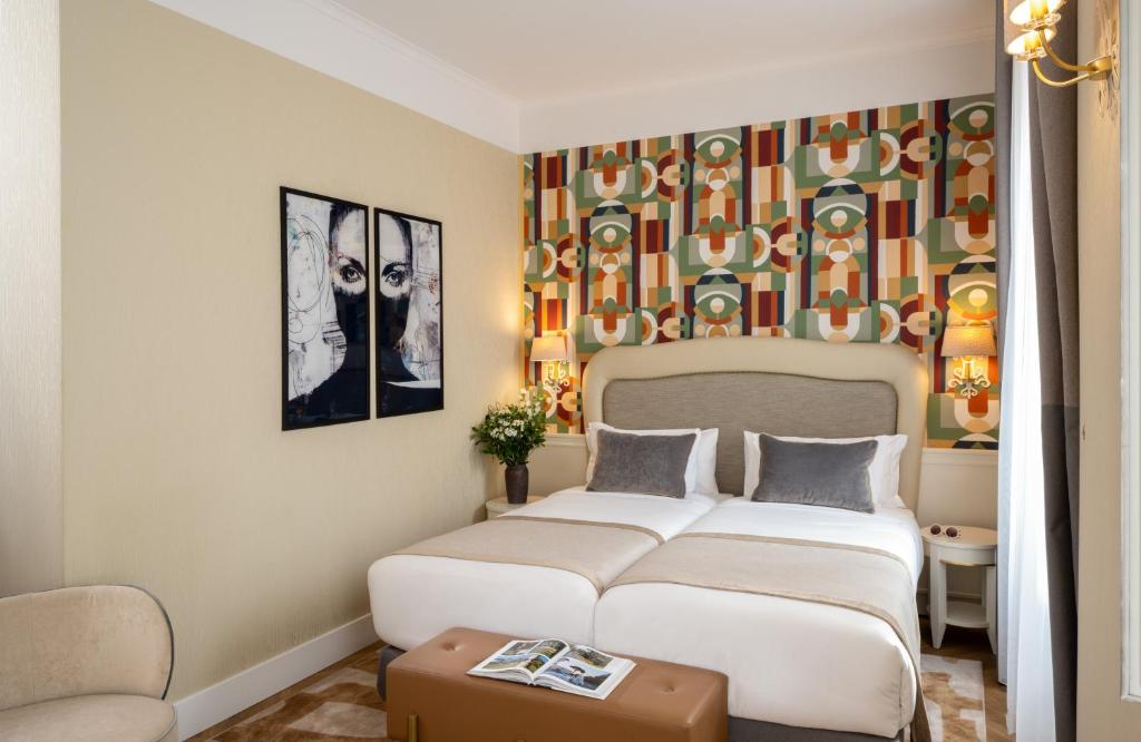 Postel nebo postele na pokoji v ubytování Leonardo Boutique Hotel Rome Monti