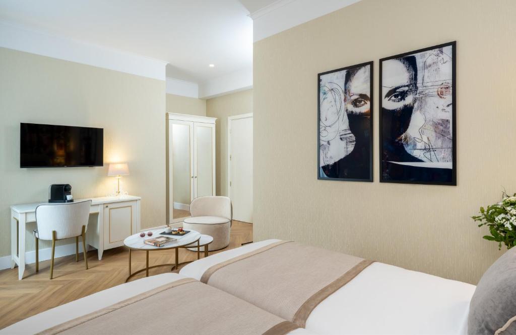 Postel nebo postele na pokoji v ubytování Leonardo Boutique Hotel Rome Monti