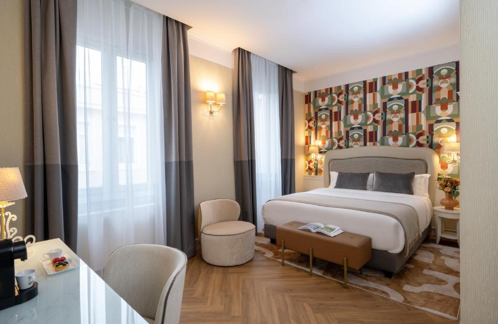 Postel nebo postele na pokoji v ubytování Leonardo Boutique Hotel Rome Monti