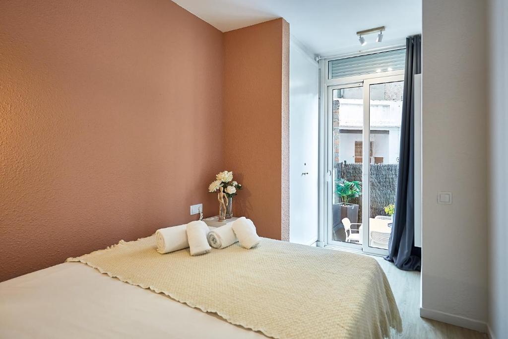 Posteľ alebo postele v izbe v ubytovaní BBarcelona Clot Apartments