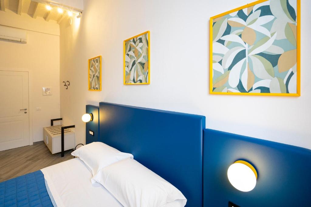 Postel nebo postele na pokoji v ubytování B&B Via Corsica 10