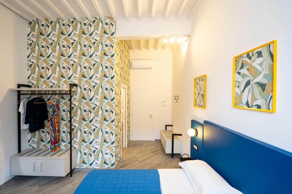 Postel nebo postele na pokoji v ubytování B&B Via Corsica 10