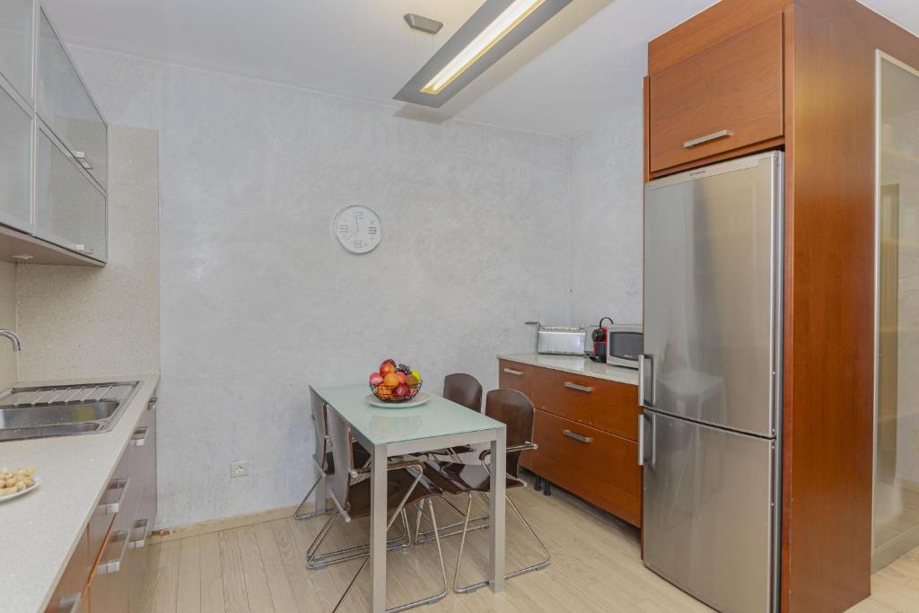 Kuchyň nebo kuchyňský kout v ubytování Apartamento Ciutadella 1