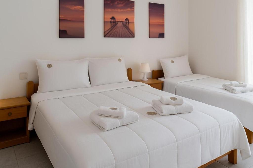 Postel nebo postele na pokoji v ubytování Mak Luxury Rooms