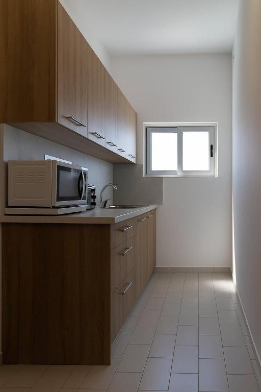 Kuchyň nebo kuchyňský kout v ubytování Mak Luxury Rooms