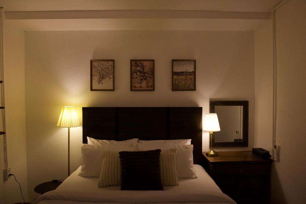 Voodi või voodid majutusasutuse Pomela Cottage-Homestay In Huế toas