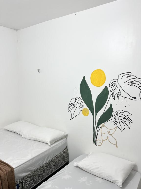 Postel nebo postele na pokoji v ubytování Pousada Marajó For You