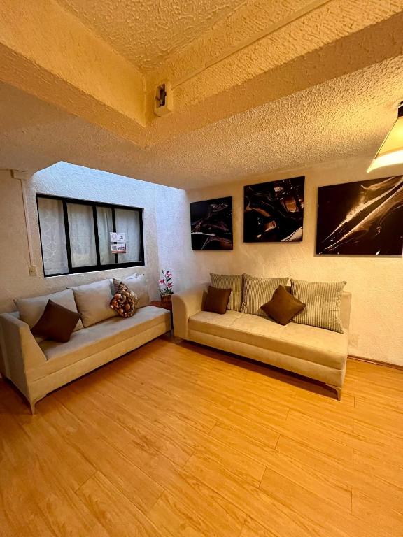 Posezení v ubytování Casita del Árbol