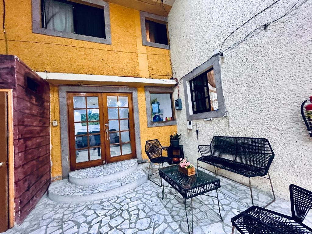 Posezení v ubytování Casita del Árbol