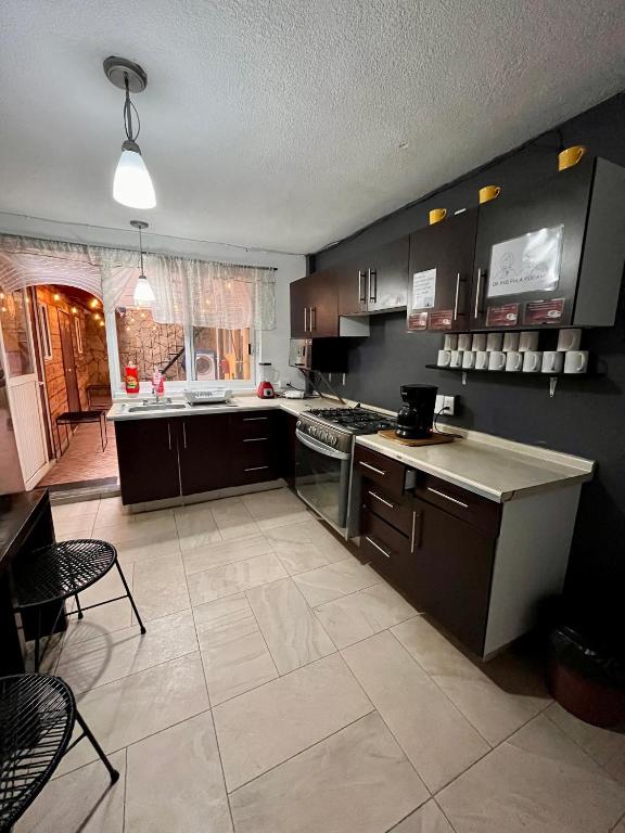 Kuchyň nebo kuchyňský kout v ubytování Casita del Árbol