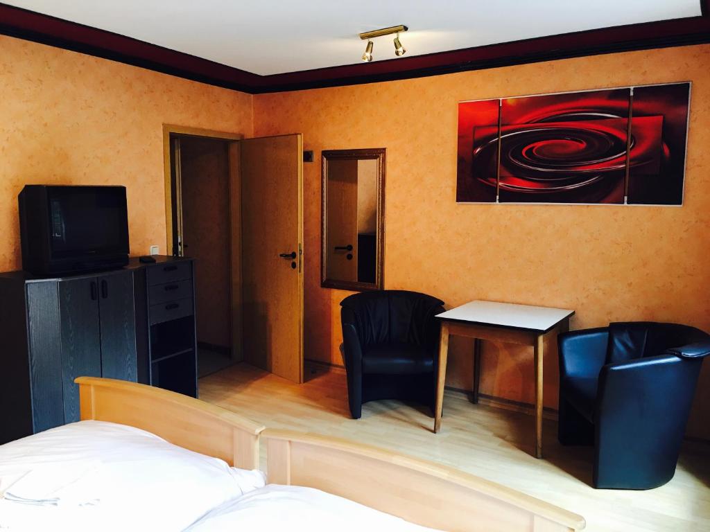 TV a/nebo společenská místnost v ubytování Bed & Breakfast du Château