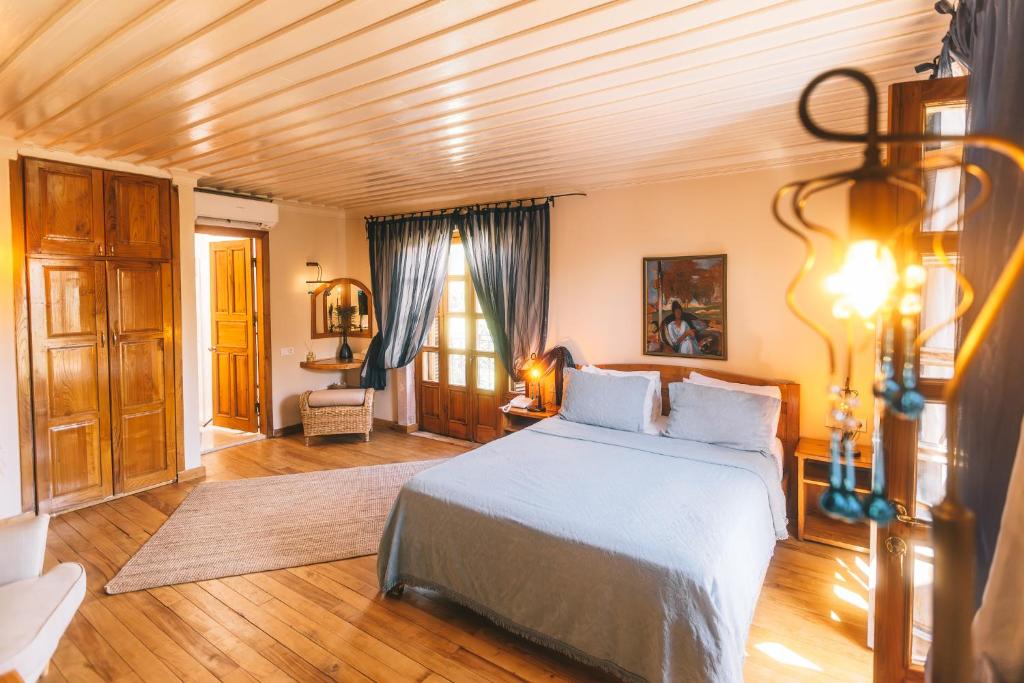 Postel nebo postele na pokoji v ubytování Jade Residence