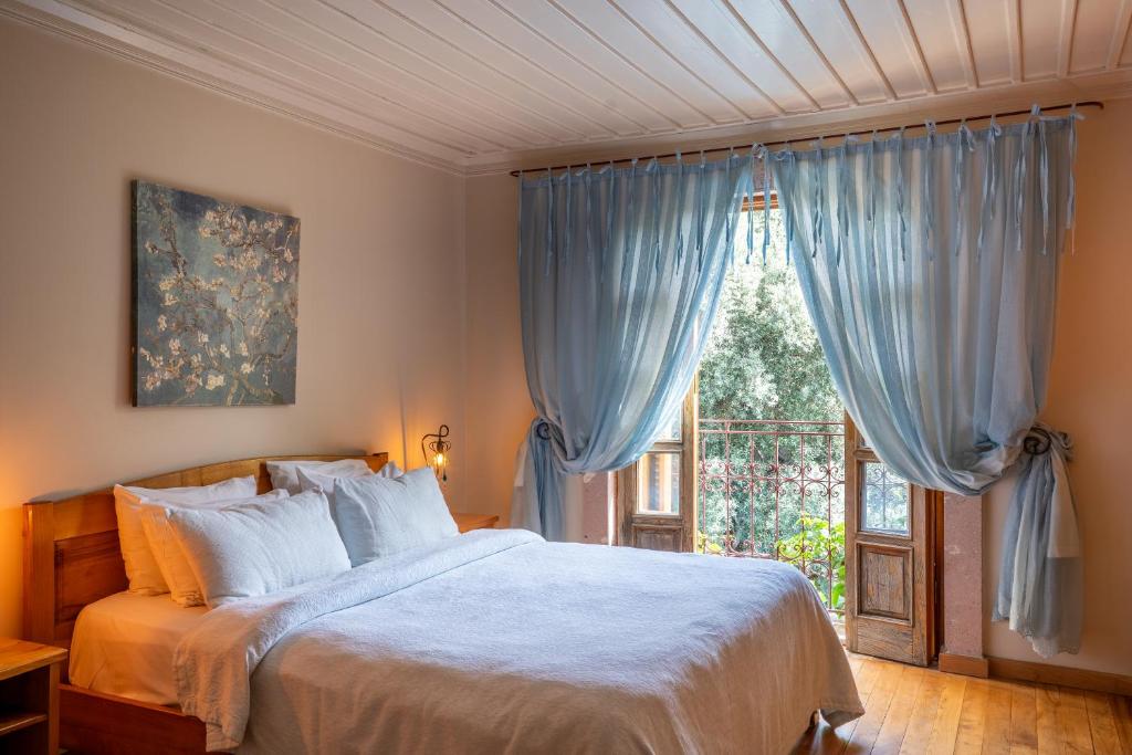 Postel nebo postele na pokoji v ubytování Jade Residence