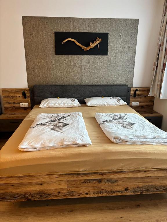 Postel nebo postele na pokoji v ubytování MountainLOVE