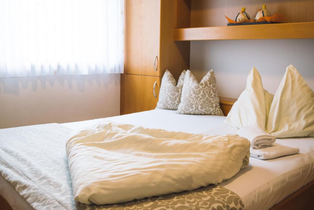 Postel nebo postele na pokoji v ubytování Hotel Restaurant Thadeushof