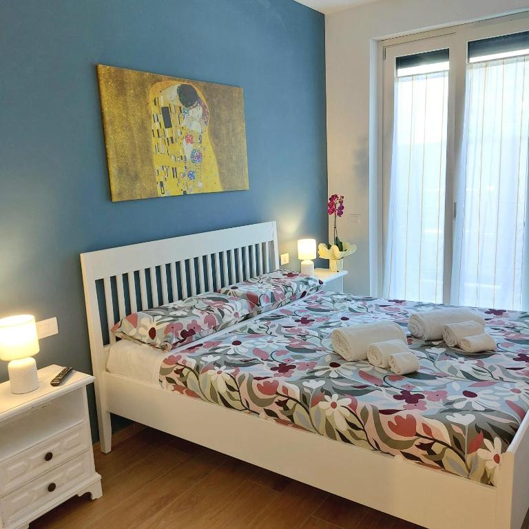 Postel nebo postele na pokoji v ubytování Casa Torrebianca