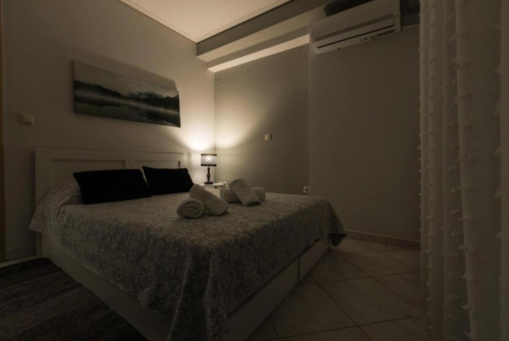 Posteľ alebo postele v izbe v ubytovaní Sparta View Apartments Anais Boutique A1