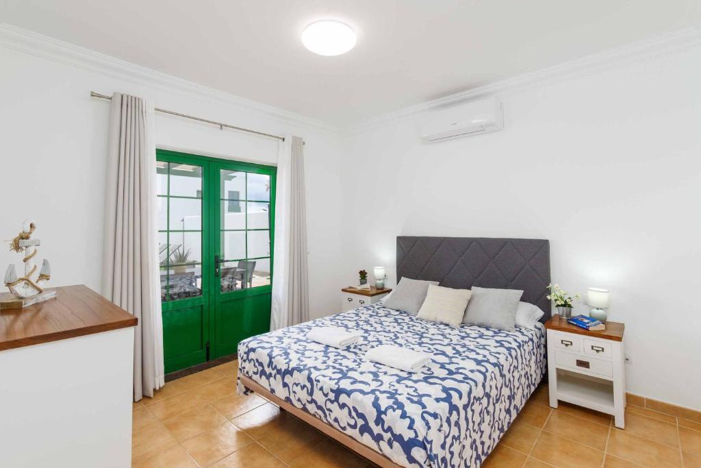 Postel nebo postele na pokoji v ubytování Villa Sargo
