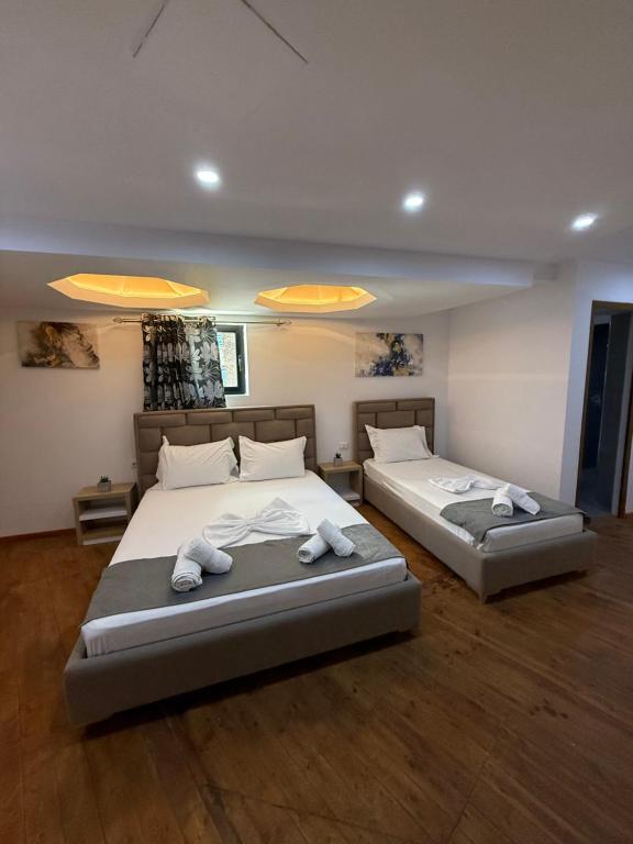 Postel nebo postele na pokoji v ubytování Hotel Summer