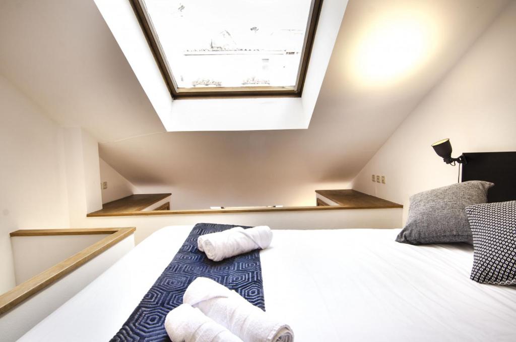 A bed or beds in a room at Apartment Fresa, 3